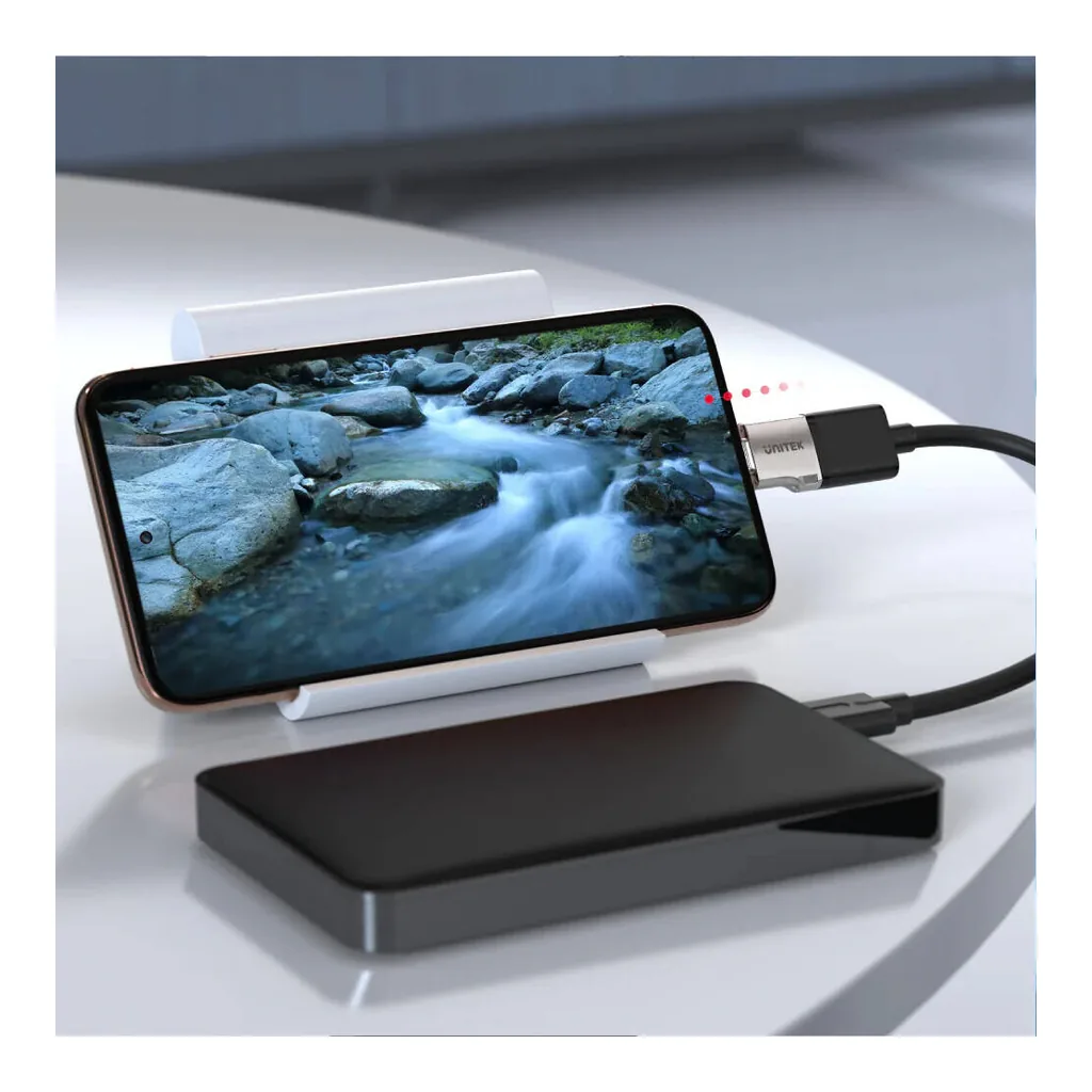 37c6afc4cc20577f1dc0d55e18907822-hi.jpg Unitek USB-C to USB-A OTG Adapter, USB3.0 5Gbps SuperSpeed, Supports OTG (On-The-Go) Function, Zinc-Alloy Housing, Silver | A1025GNI