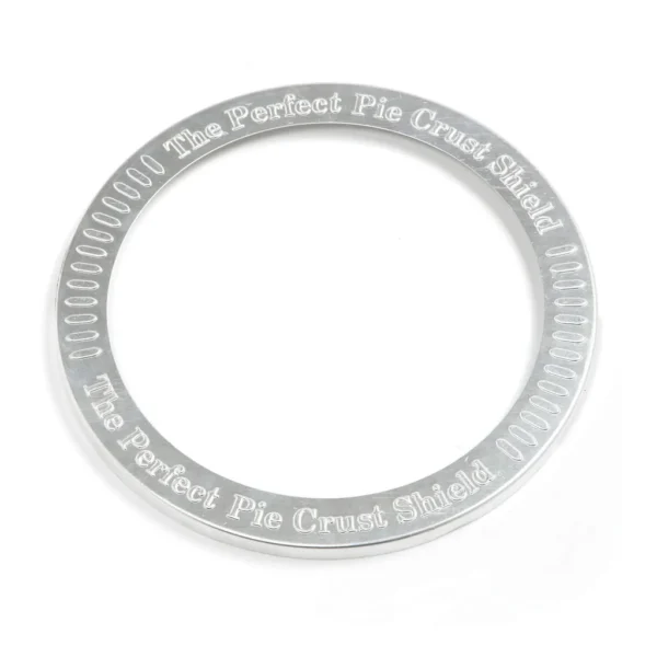 44e8d93a-c00f-405b-80b2-c07121e964e9.jpg Norpro - Aluminum 10-Inch Pie Crust Shield - Silver
