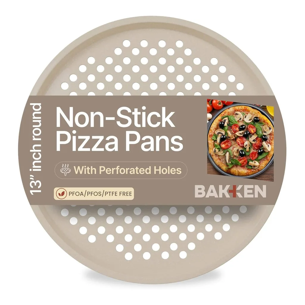 6b34cc46-00c8-455d-a744-8b337d4e0b81.jpg Bakken- Swiss - Bakken Round Pizza Pan – Perforated Carbon Steel, Non-Stick Marble Coating, Silicone Handle, Dishwasher Safe - White