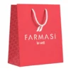 FARMASI Carton Bag Small — Coral — Single empty Coral carton bag on white background FARMASI Carton Bag Small — Coral — Single empty Coral carton bag on white background