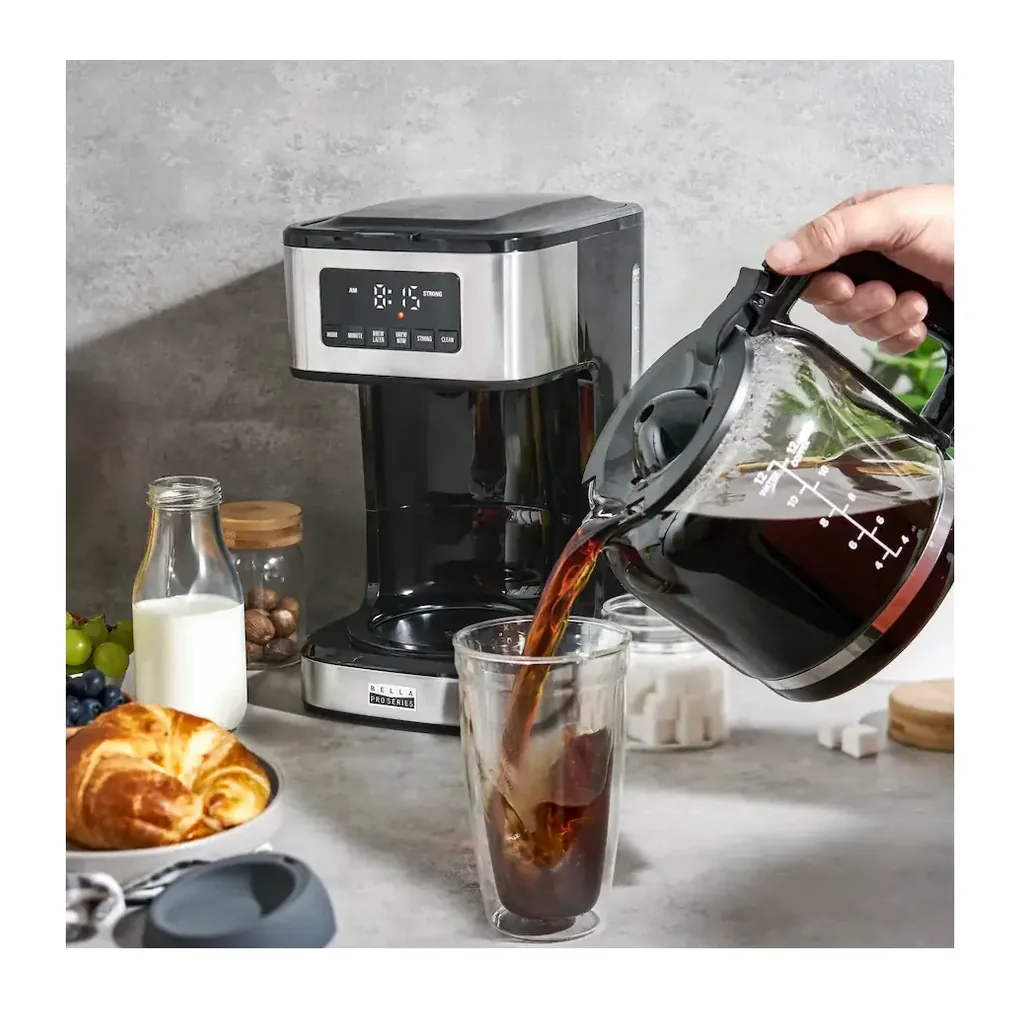 bella PRO 90194 - Pouring coffee lifestyle view bella PRO 90194 stainless steel 12-cup programmable coffee maker, pouring coffee lifestyle view