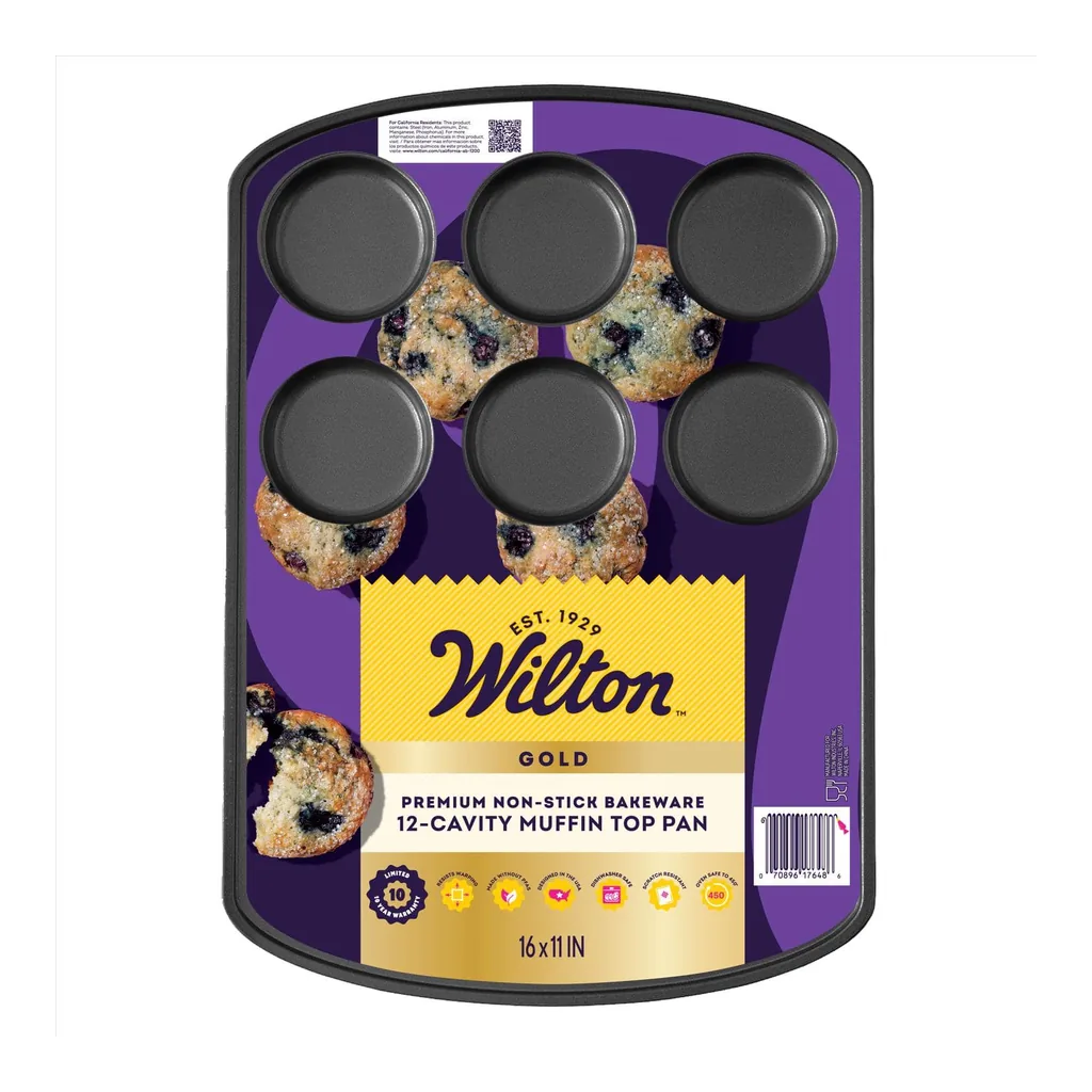 d0a316af-1db7-4855-a5eb-802a61625084.jpg Wilton - Gold 11 in. W X 16 in. L 12 Cavity Muffin Top Muffin Pan Black 1 pc